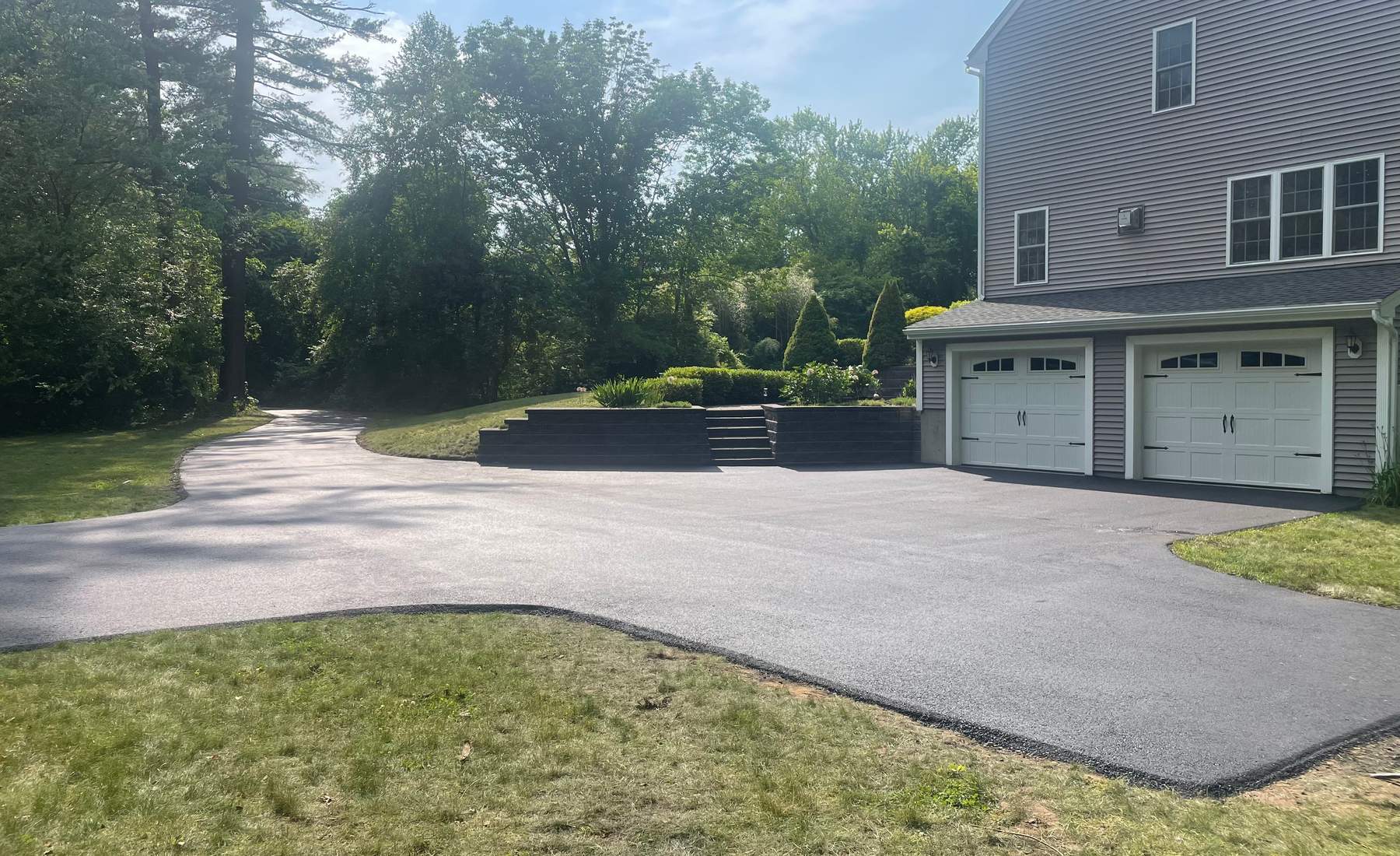 Kane Paving crew laying asphalt in Plympton, MA
